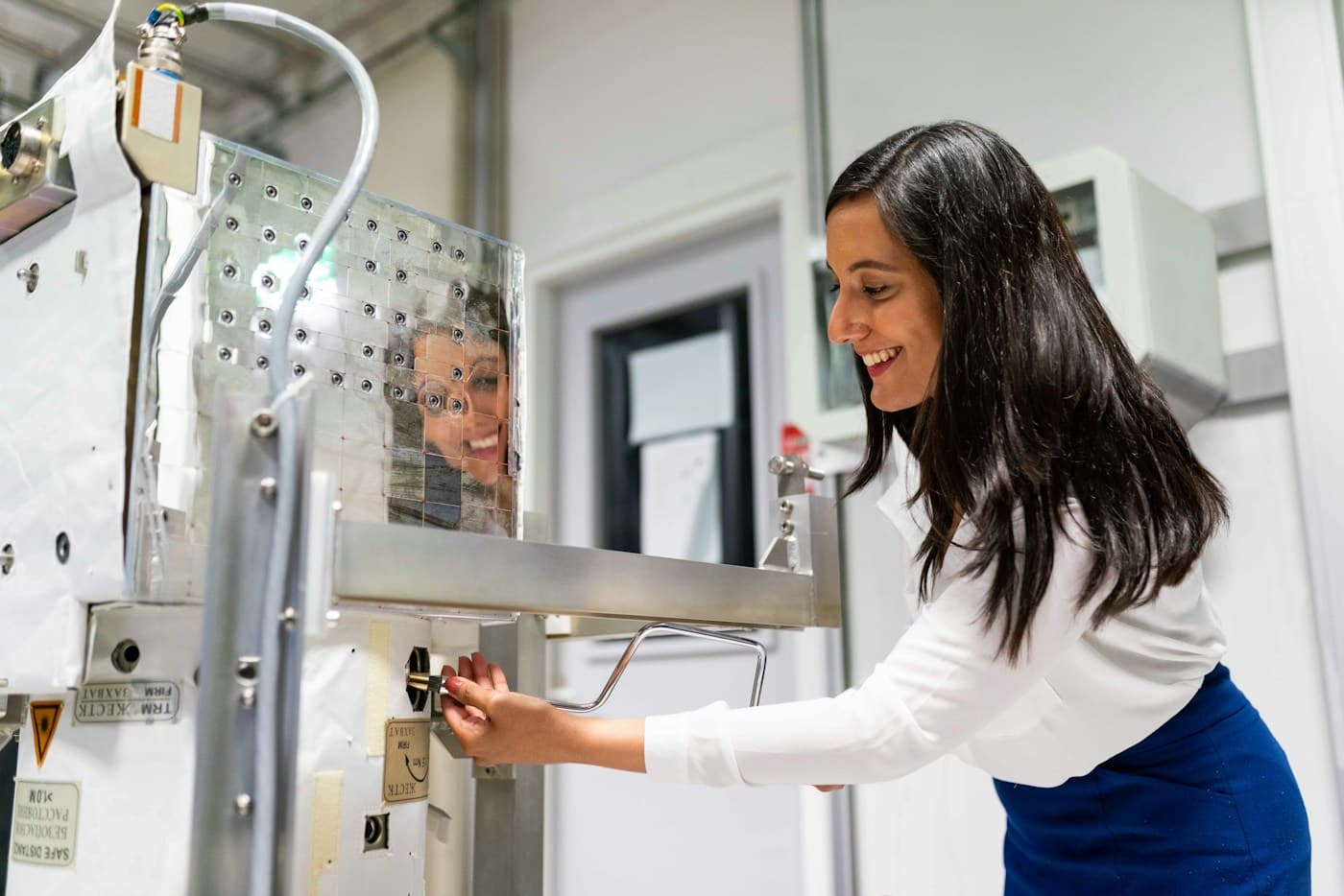 An engineer working on a piece of equipment